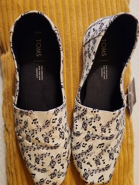 Toms Ivory Canvas Slip-On Flats with Black Music Note Print